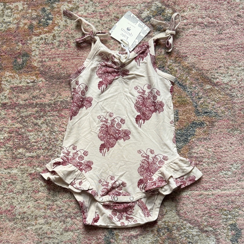NWT Kate Quinn ruffle leg bodysuit